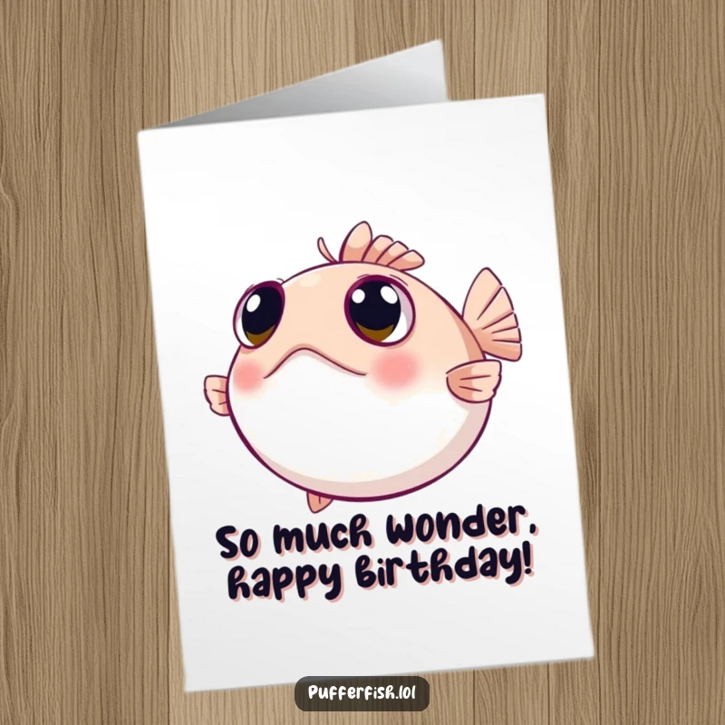 Funny Free Printable Birthday Card: A pufferfish with wide, curious eyes looking around inquisitively, ready for adventure.