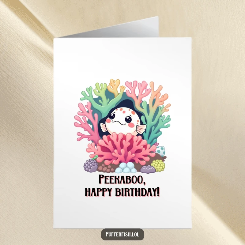 Funny Free Printable Birthday Card: Curious pufferfish peeking from behind a vibrant coral reef, wishing a happy birthday.