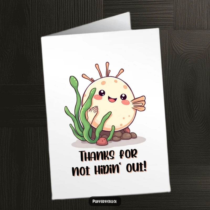 Funny Free Printable Thank You Card: A kawaii pufferfish playfully hiding behind a sea plant, shyly expressing thanks.