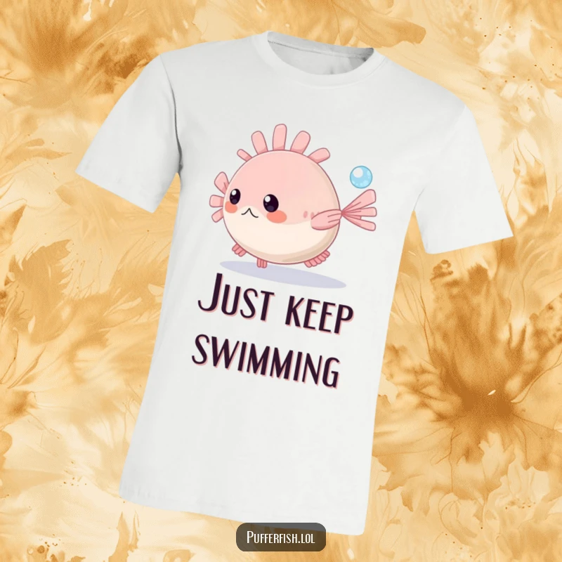 Funny Pufferfish T-Shirt: A cheerful pufferfish playfully pursues a shimmering bubble in the clear blue sea, embodying pure aquatic fun.