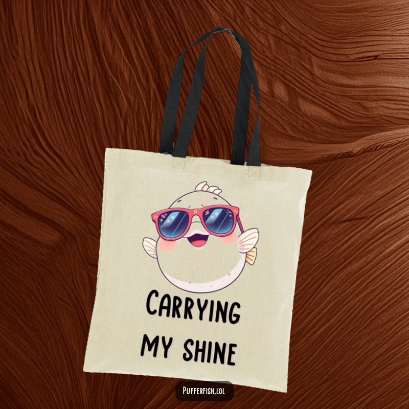 Funny tote bag: a laughing pufferfish in oversized, sparkly sunglasses, ready to carry your belongings with a smile and flair.